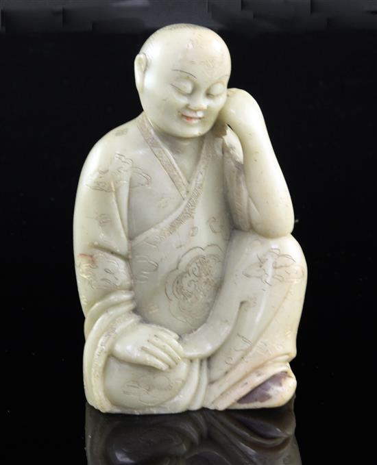 A Chinese soapstone seated figure of a luohan, 17th / 18th century, 10.5cm